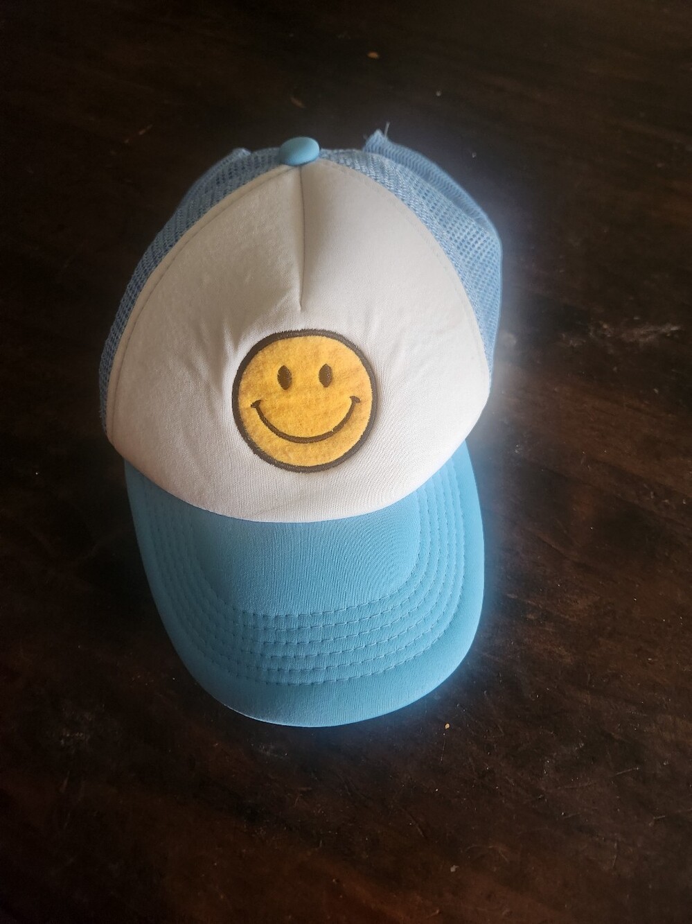 Blue and White Trucker Hat with Yellow Smiley Patch